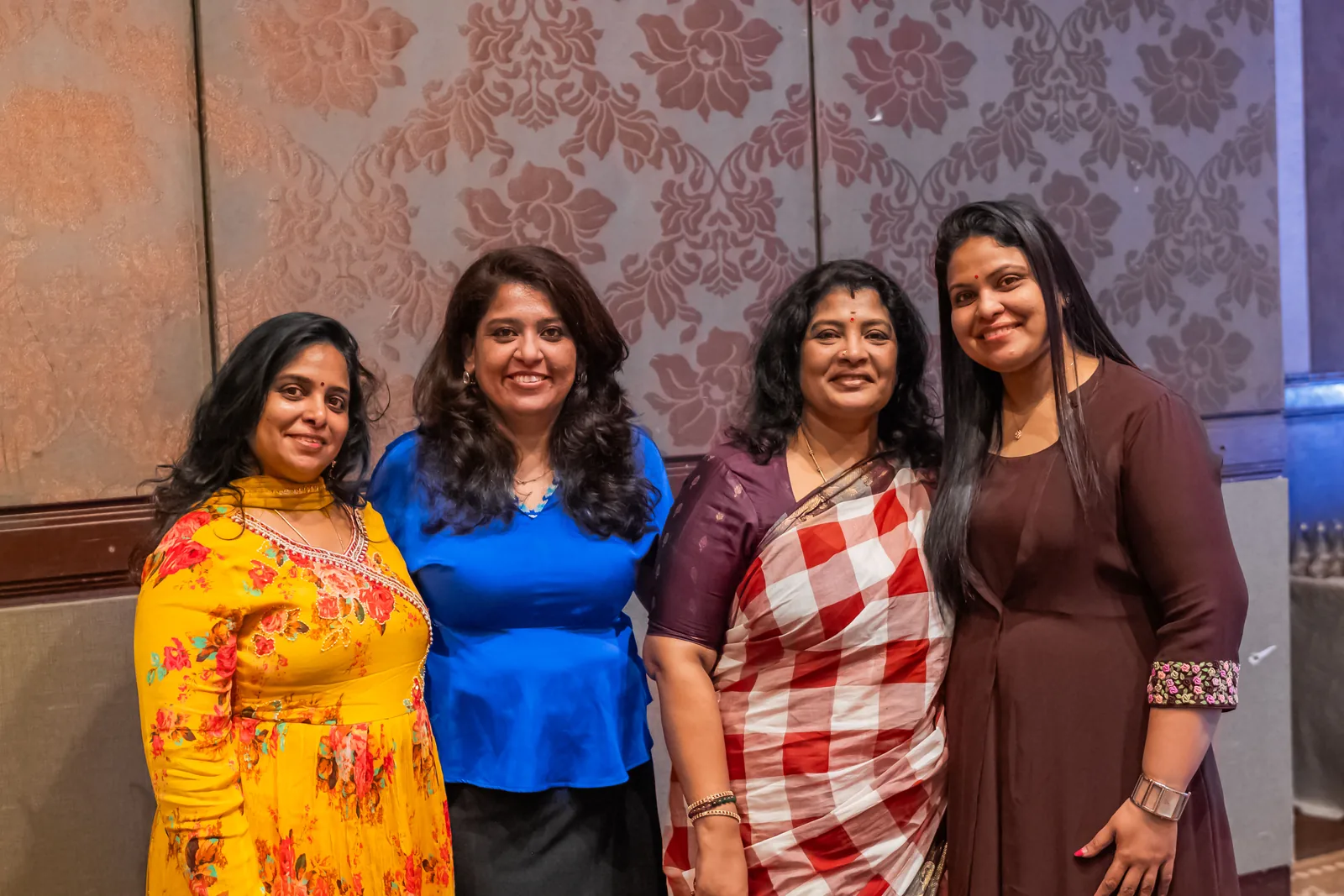 Meera Grover with attendees after a session